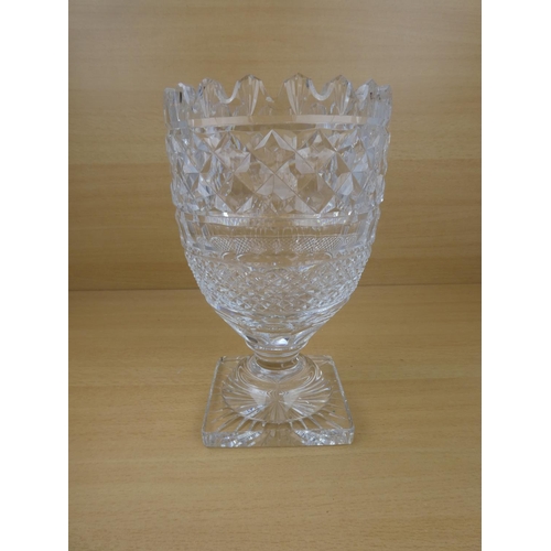 194 - A stunning large and heavy Waterford Crystal vase (small chip), measuring 26cm in height.