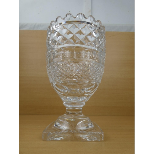 194 - A stunning large and heavy Waterford Crystal vase (small chip), measuring 26cm in height.