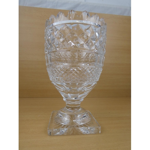 194 - A stunning large and heavy Waterford Crystal vase (small chip), measuring 26cm in height.