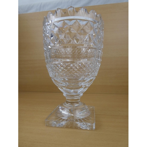 194 - A stunning large and heavy Waterford Crystal vase (small chip), measuring 26cm in height.