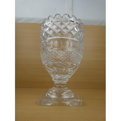 194 - A stunning large and heavy Waterford Crystal vase (small chip), measuring 26cm in height.