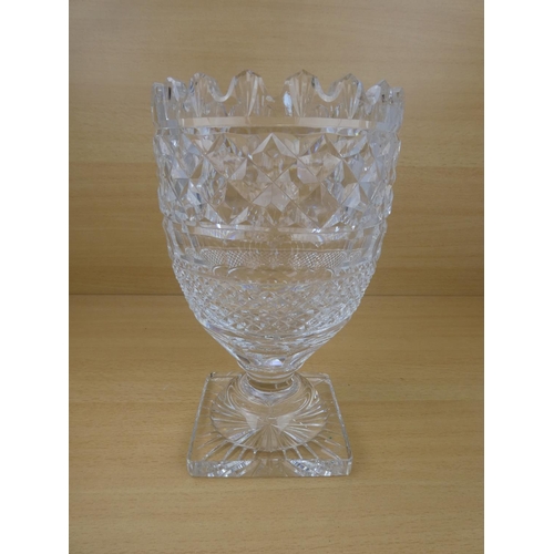 194 - A stunning large and heavy Waterford Crystal vase (small chip), measuring 26cm in height.