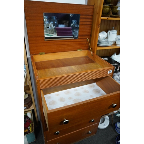 207 - A vintage chest of four drawers with lift up dressing table mirror, measuring 60x95x43cm.