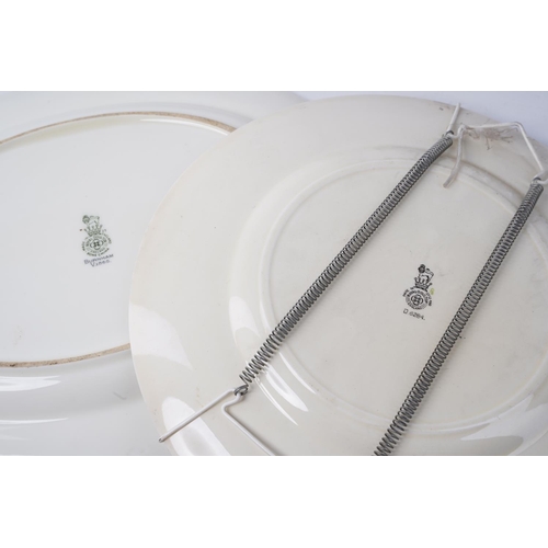 225 - A Royal Doulton 'The Squire' collectors plate and a Royal Doulton 'Burnham' oval platter.