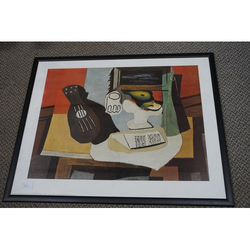 355 - A framed Picasso print 'Guitar, Glass and dish with fruit', measuring 75x50cm.