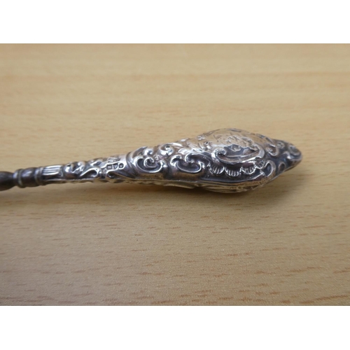 376 - A stunning Sterling Silver handled button hook.