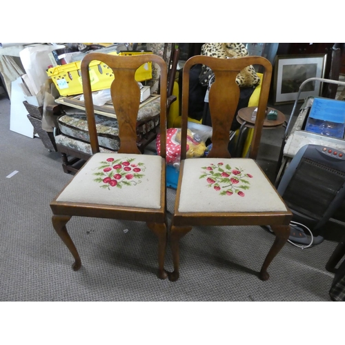 427 - A pair of vintage chairs with tapestry seats.