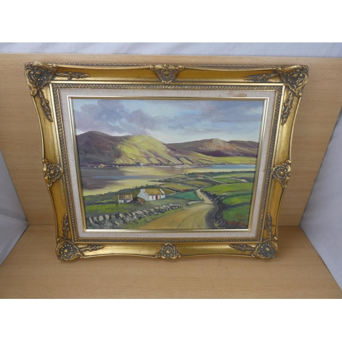 446 - A stunning gilt framed oil painting 'Donegal Cottages' signed JJ O'Neill.