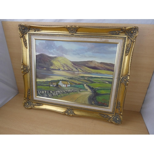 446 - A stunning gilt framed oil painting 'Donegal Cottages' signed JJ O'Neill.