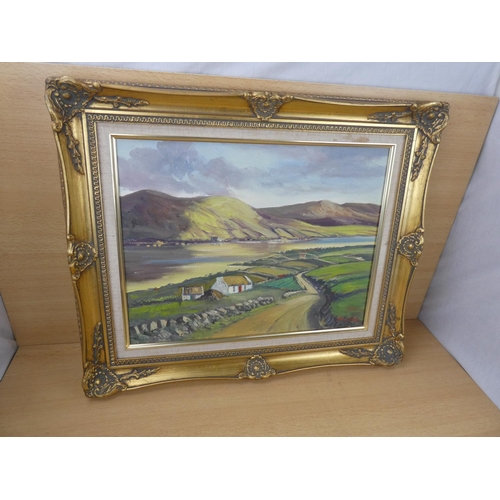 446 - A stunning gilt framed oil painting 'Donegal Cottages' signed JJ O'Neill.