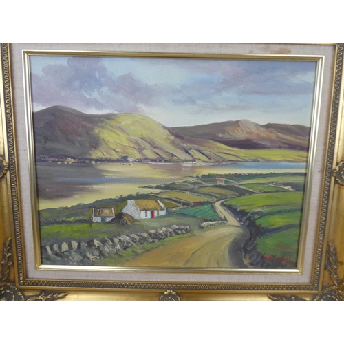 446 - A stunning gilt framed oil painting 'Donegal Cottages' signed JJ O'Neill.