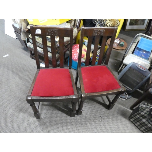 449 - A pair of oak framed chairs.