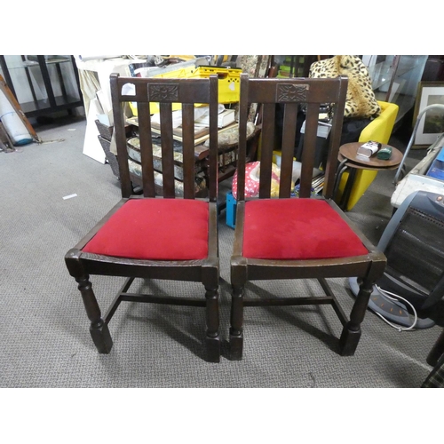 449 - A pair of oak framed chairs.