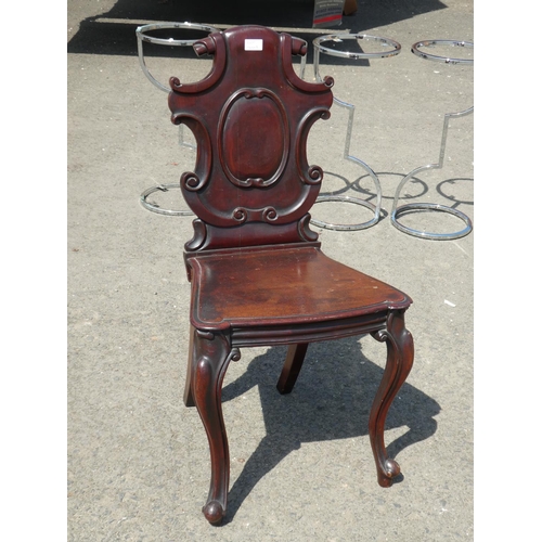 463 - An antique mahogany shield back chair.