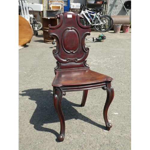 463 - An antique mahogany shield back chair.