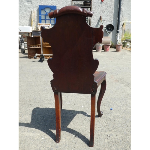 463 - An antique mahogany shield back chair.