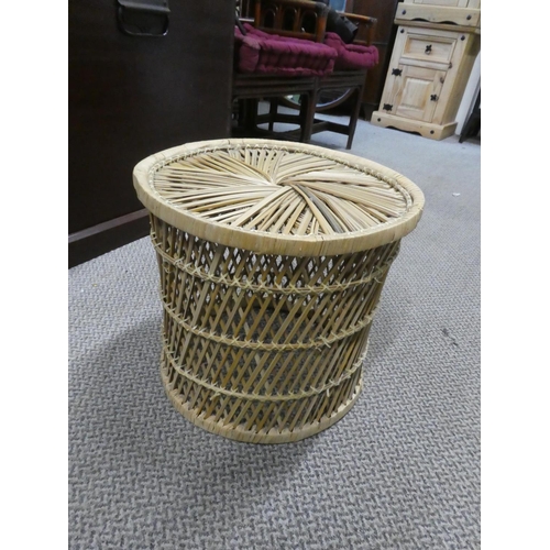 473 - A vintage rattan stool/table.