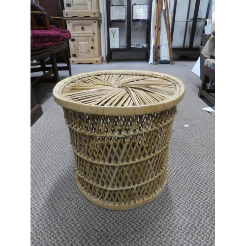 473 - A vintage rattan stool/table.