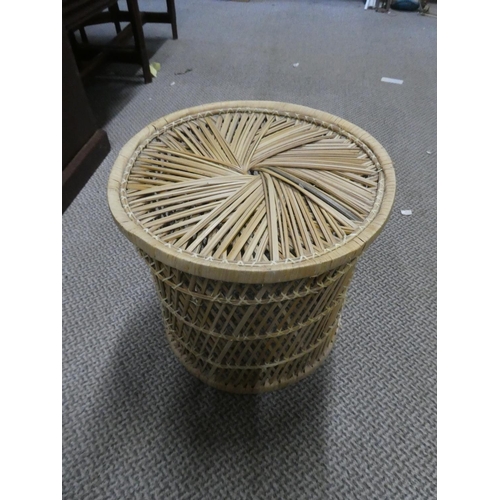 473 - A vintage rattan stool/table.