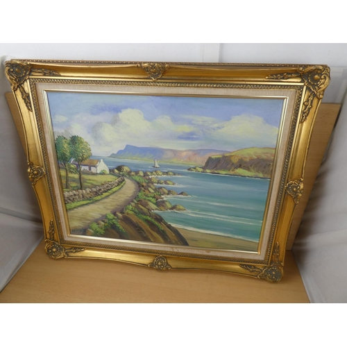 515 - A stunning gilt framed oil painting 'The Coast Road' signed JJ O'Neill, measuring 75x60cm.