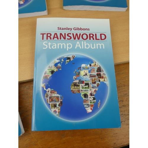 534 - Five Stanley Gibbons 'Transworld Stamp Albums' and contents.