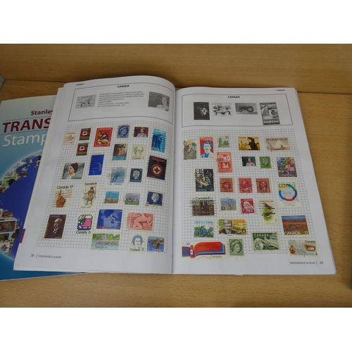 534 - Five Stanley Gibbons 'Transworld Stamp Albums' and contents.