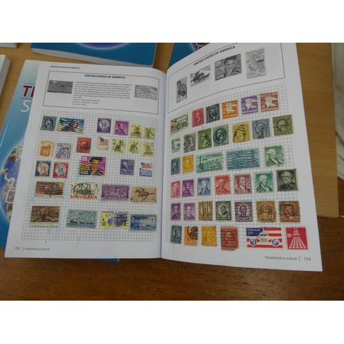 535 - Five Stanley Gibbons 'Transworld Stamp Albums' and contents.