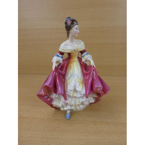 551 - A Royal Doulton figure, 'Southern Belle' HN2229.