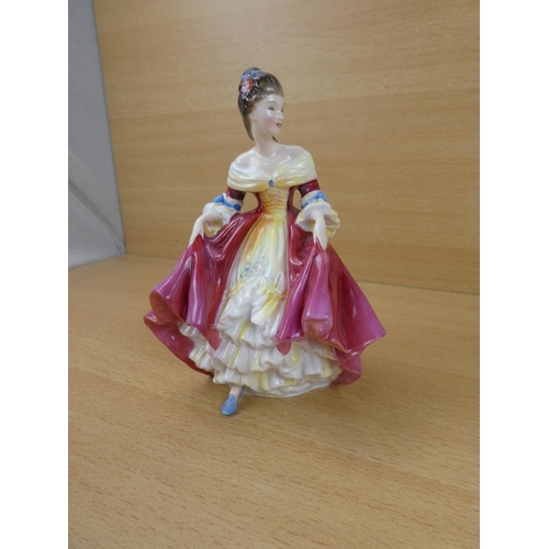 551 - A Royal Doulton figure, 'Southern Belle' HN2229.