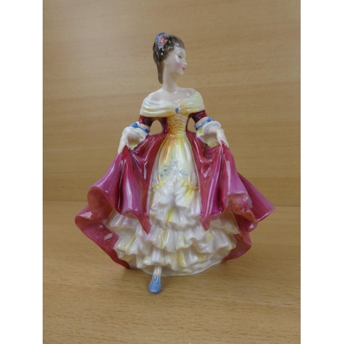 551 - A Royal Doulton figure, 'Southern Belle' HN2229.