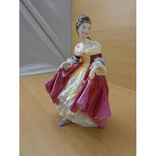 551 - A Royal Doulton figure, 'Southern Belle' HN2229.