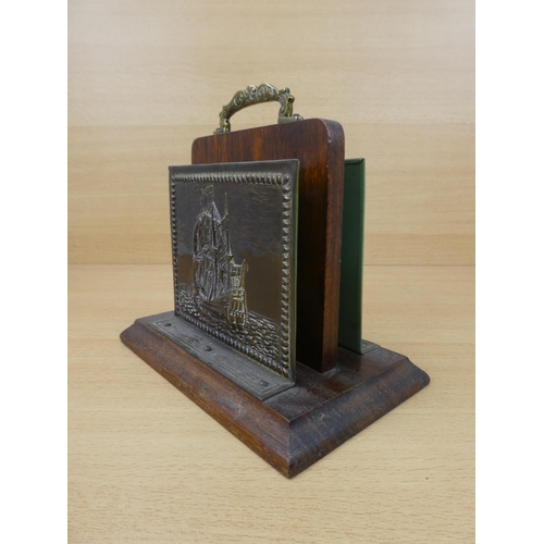 553 - A vintage brass letter holder with ship design.