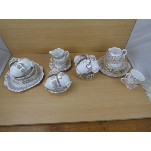 565 - Three vintage similar part tea sets.