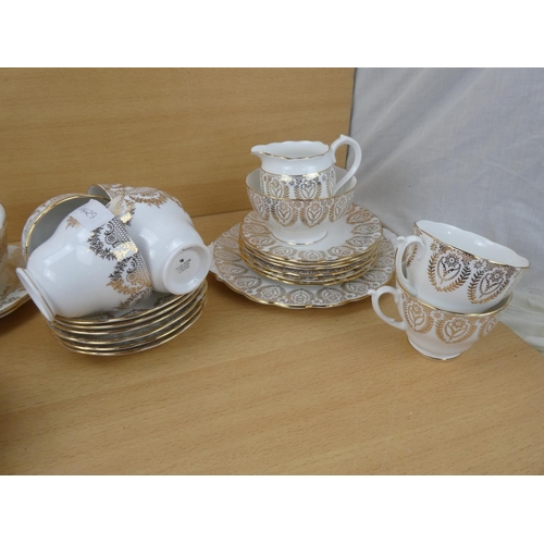 565 - Three vintage similar part tea sets.