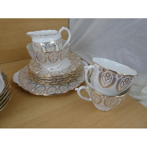 565 - Three vintage similar part tea sets.