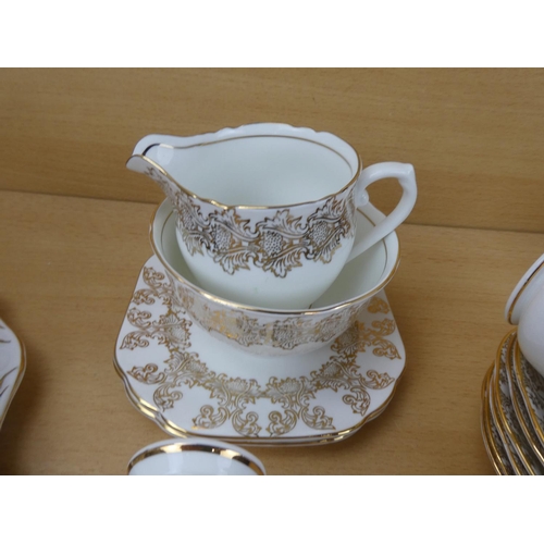 565 - Three vintage similar part tea sets.