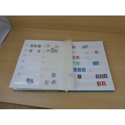 573 - A vintage stamp album & contents.