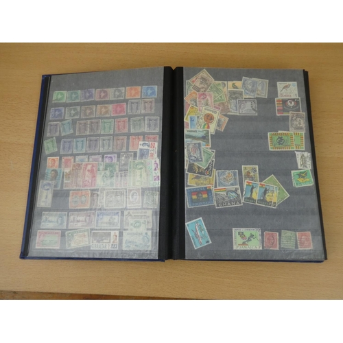 583 - A superb vintage stamp album containing a large quantity of Commonwealth stamps.