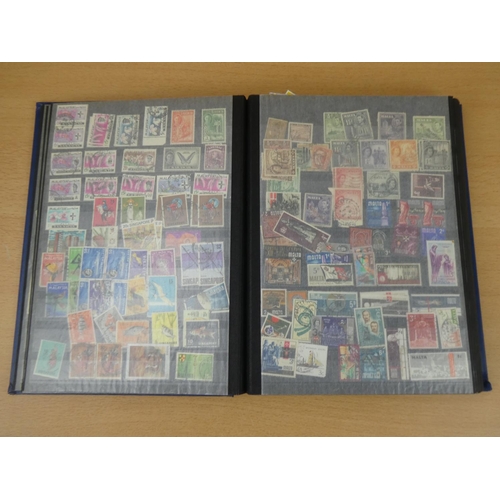 583 - A superb vintage stamp album containing a large quantity of Commonwealth stamps.