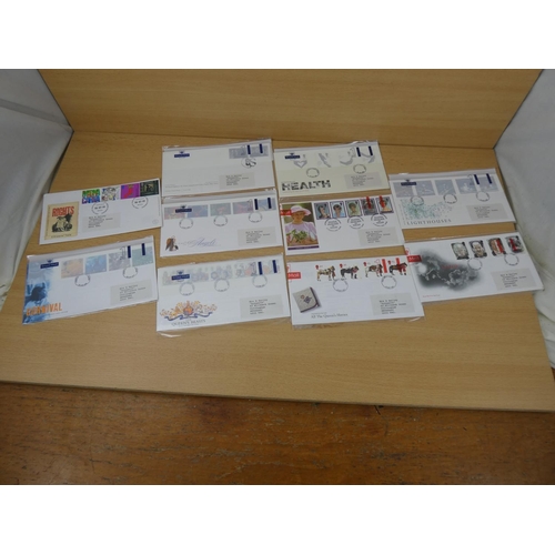 593 - Ten packs of Royal Mail first day covers.