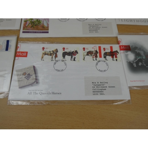 593 - Ten packs of Royal Mail first day covers.