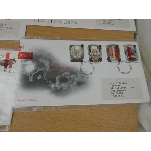 593 - Ten packs of Royal Mail first day covers.