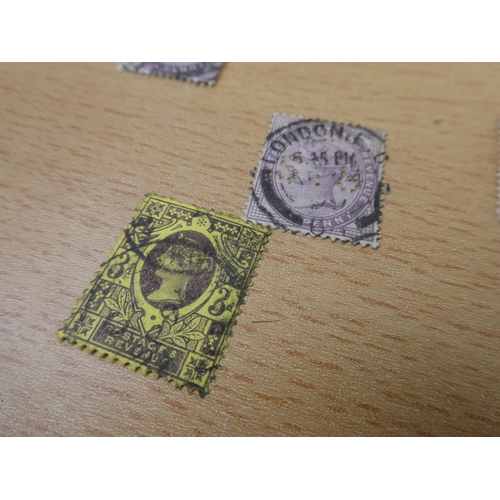 597 - A collection of used postage stamps.