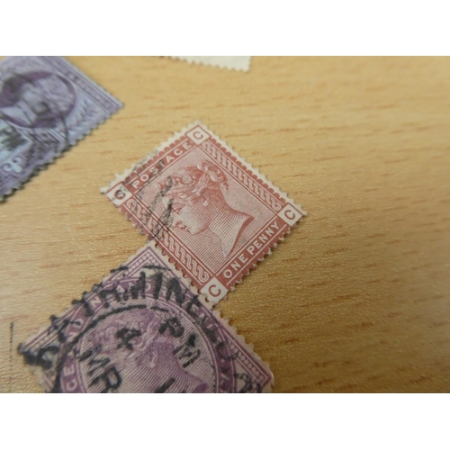 597 - A collection of used postage stamps.