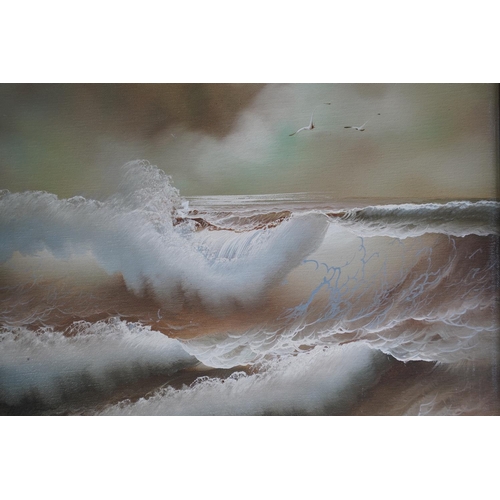 611 - A framed oil painting of rough seas signed, measuring 39x49cm.