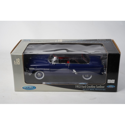 720 - A boxed Welly 1953 Ford Crestline Sunliner, scale 1:18.