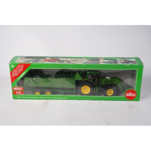 726 - A boxed Siku metal 336524 John Deere with Front Loader and trailer set, scale 1:32