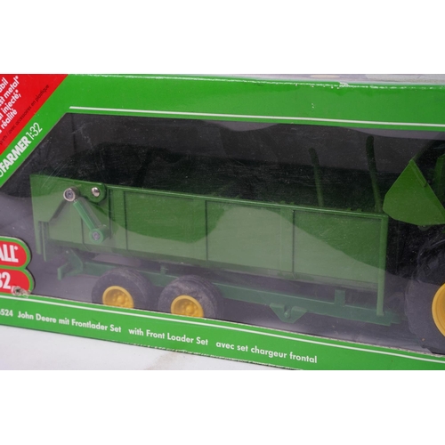 726 - A boxed Siku metal 336524 John Deere with Front Loader and trailer set, scale 1:32