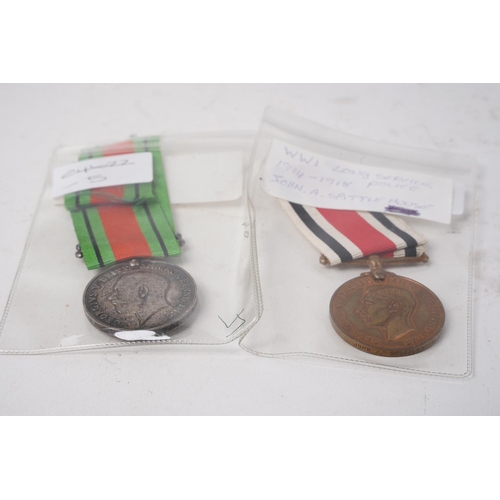 762 - A stunning WW1 Long Service Police medal 1914 - 1918 for John A Spittlehouse and a WW1 British War m... 