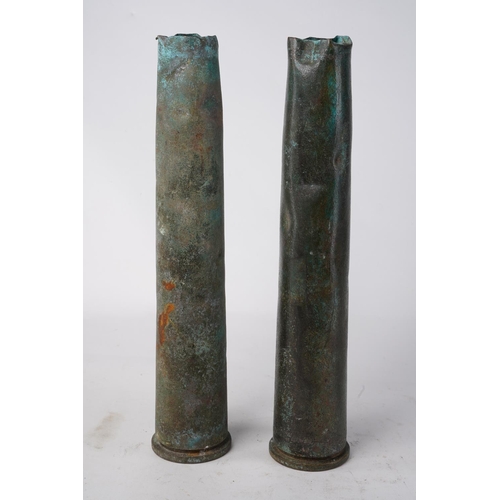 781 - Two antique copper shell cases.